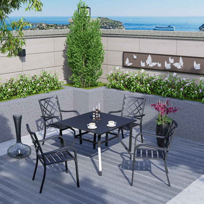 Winston Porter Jayc 5 piece Outdoor Wrought Iron Patio Dining Set With 4 Stackable Metal Chairs And 1 Square Dining Table With 1.57 Umbrella Hole Reviews Wayfair